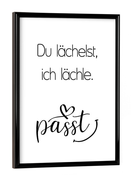 Poster mit schwarzem Rahmen "Du lächelst" artboxONE - Typografie,Liebe