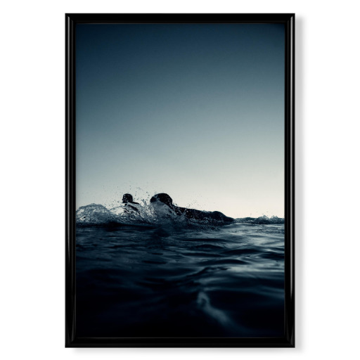 Blue hour surfing in the sea