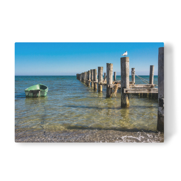 Leinwandbild "Buhne, Boot und Möwe" artboxONE - Natur,Reise,Reise / Strand und Meer