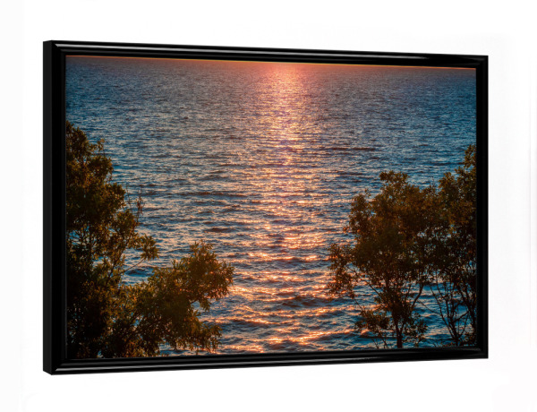 Poster mit schwarzem Rahmen "Sonnenaufgang über dem Meer" artboxONE - Natur,Reise