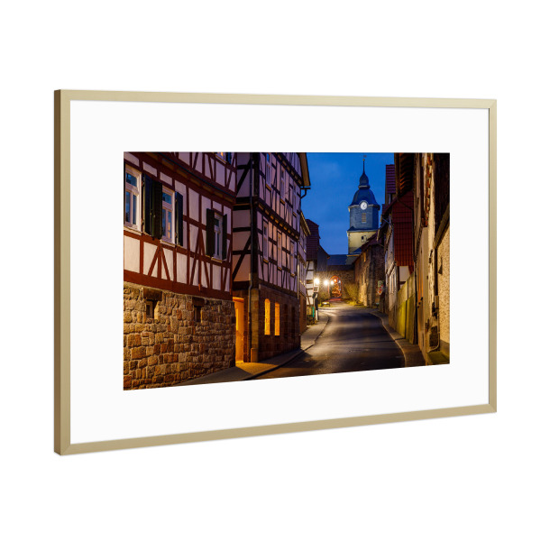 Poster mit Rahmen Gold "Herleshausen bei Nacht" artboxONE - Architektur