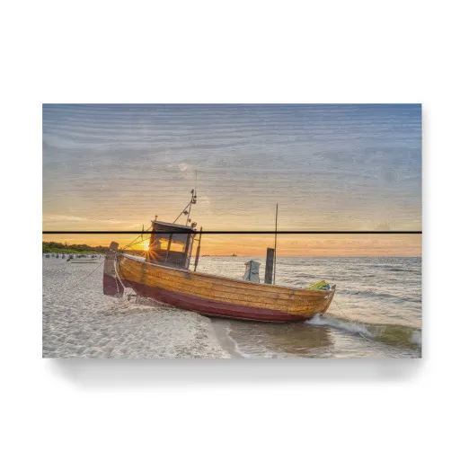 Fishing boat at sunset print by Michael Valjak