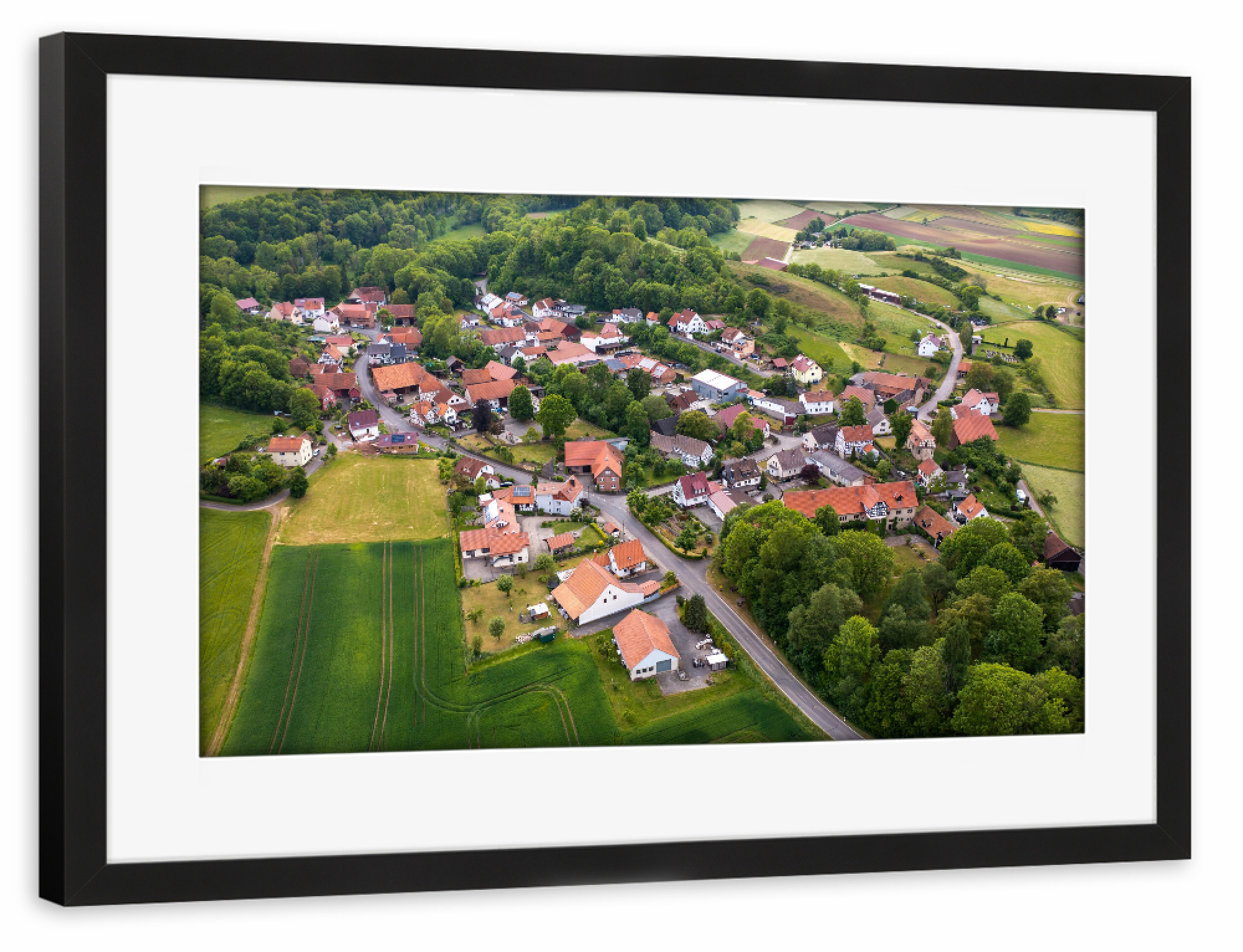 Poster mit Rahmen schwarz "Lüderbach auf dem Ringgau" artboxONE - Natur,Architektur