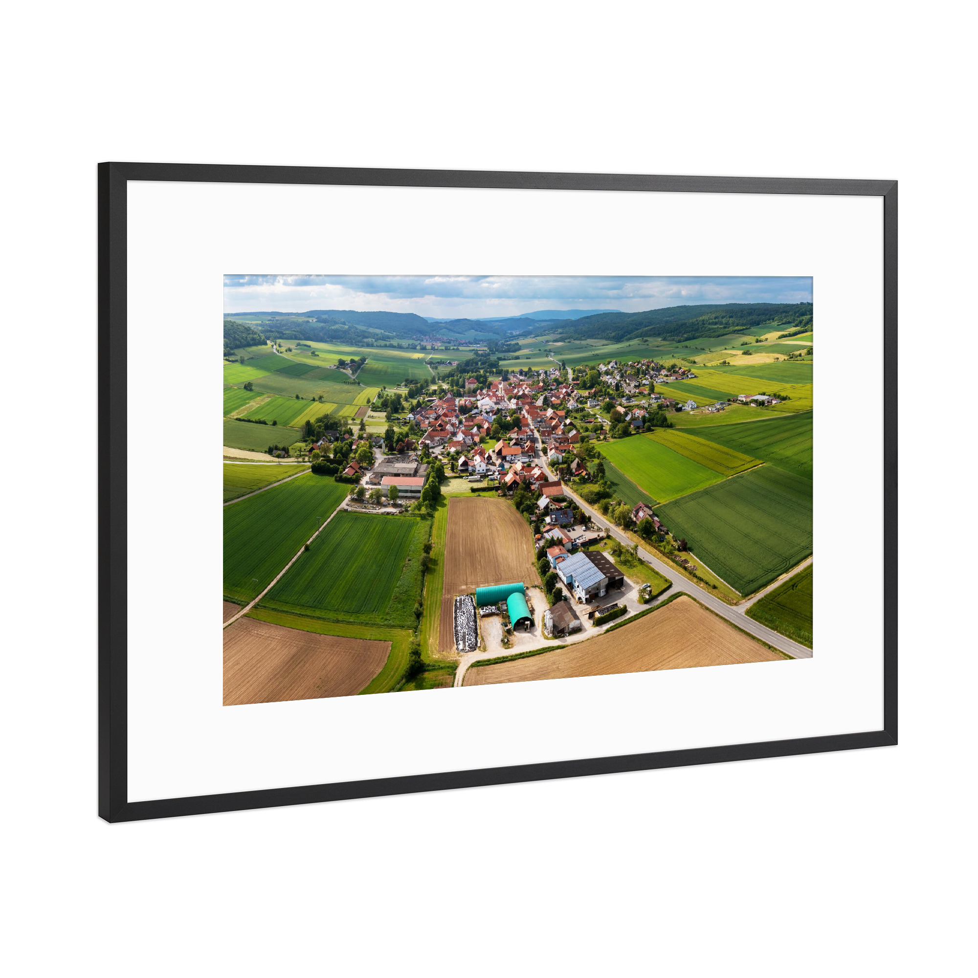 Poster mit Rahmen Schwarz (Metallic) "Netra im schönen Nordhessen" artboxONE - Natur,Architektur