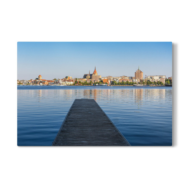 Galerie-Print "Warnow, Steg, Schiff, Stadt" 30x20 cm artboxONE
