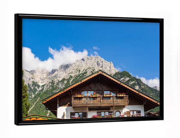 Poster mit schwarzem Rahmen "Wolken, Haus, Berge" artboxONE - Natur,Reise,Architektur