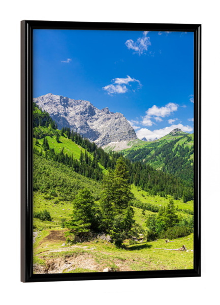 Poster mit schwarzem Rahmen "Tal, Gebirge, Wolken" artboxONE - Natur,Reise