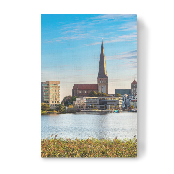 Leinwandbild "Kirche, Schilf, Fluss, Wolken" artboxONE - Natur,Reise,Architektur
