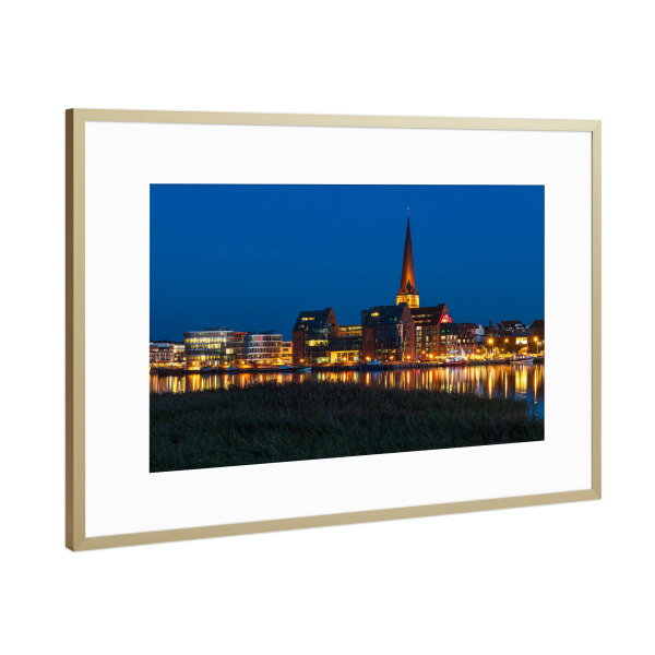 Poster mit Rahmen Gold "Warnow, Kirche, Lichter" artboxONE - Natur,Reise,Architektur