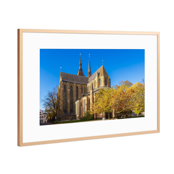 Poster mit Rahmen Kupfer "Marienkirche in Rostock im Herbst" artboxONE - Städte,Reise,Architektur