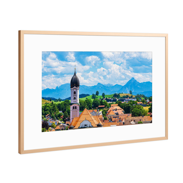 Poster mit Rahmen Kupfer "Nesselwang mit der Pfarrkirche" artboxONE - Natur,Reise,Architektur