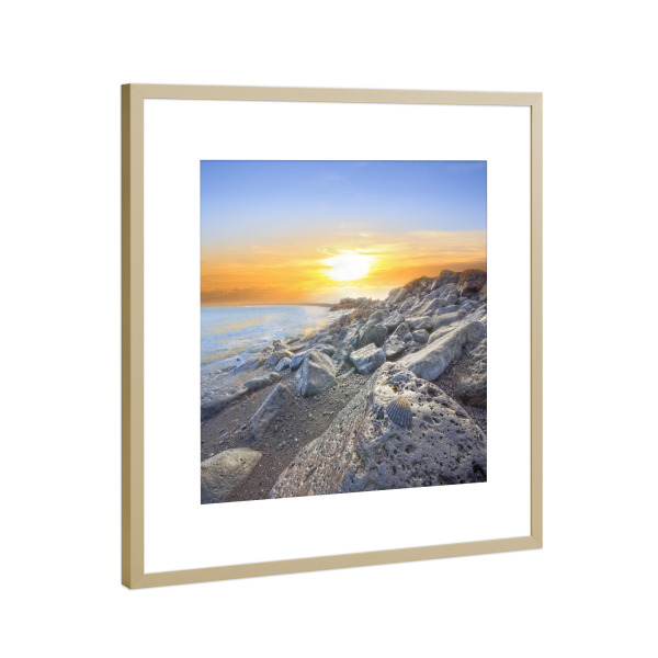 Poster mit Rahmen Gold "Basalt Rocks Seashore with Black Seashell" artboxONE - Reise / Strand und Meer
