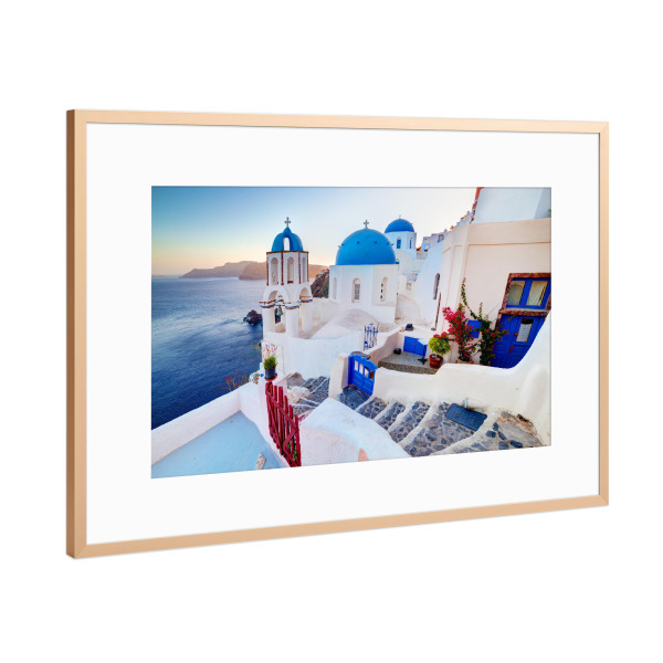 Poster mit Rahmen Kupfer "Oia town on Santorini island, Greece at sunset. Rocks on Aegean" artboxONE - Reise