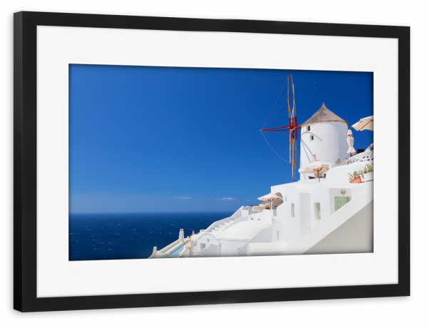 Poster mit Rahmen schwarz "Oia town on Santorini island, Greece. Famous windmills" artboxONE - Reise
