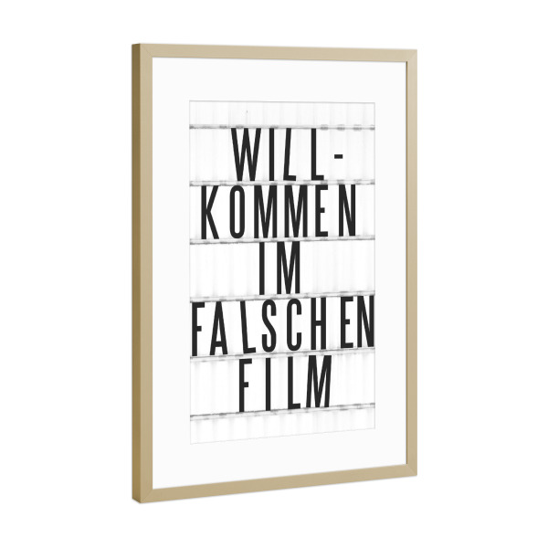 Poster mit Rahmen Gold "Willkommen im falschen Film" artboxONE - Typografie,Film,Schwarzweiß