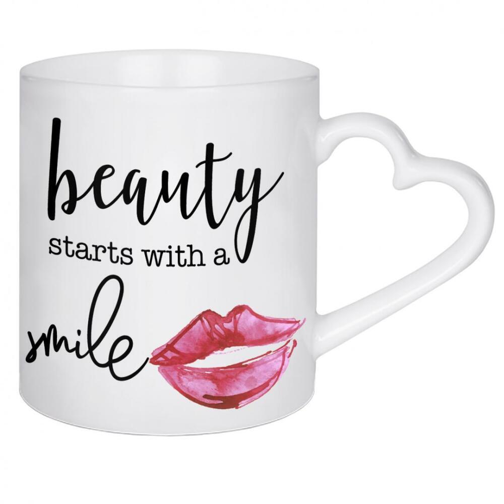 Herztasse "Beauty Starts With A Smile" artboxONE - Typografie,Fashion - Make-up,Lächeln,Lippen,Schönheit