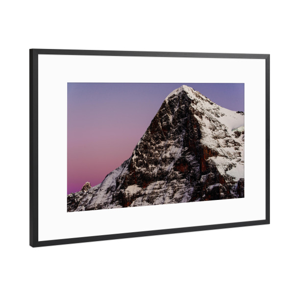 Poster mit Rahmen Schwarz (Metallic) "Eiger north face at sunset" artboxONE - Natur