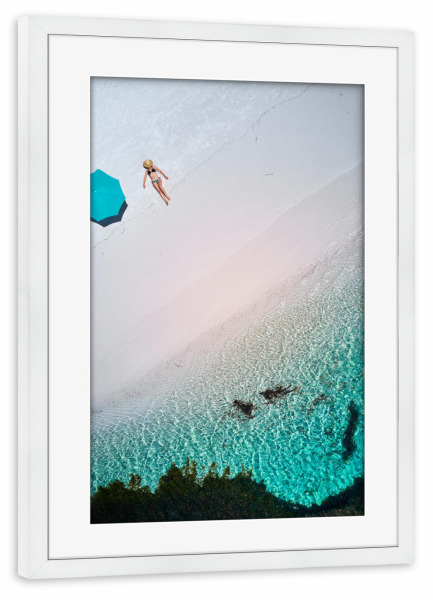 Poster mit Rahmen weiß "Lady laying at the Beach" artboxONE - Natur,Reise / Strand und Meer - Beach,Beachday,Swimming,Ocean,Drone,Waves